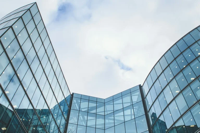 High-rise glazing with Vista Atmosphere exterior window film applied by OOVO DFW